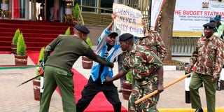 A man is arrested for attempting to demonstrate outside the National Treasury ahead of the delivery of the 2023/2024 budget