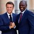 French President Emmanuel Macron (left) shakes hands with Kenyan President William Ruto