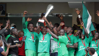 Gor Mahia players celebrate with the trophy