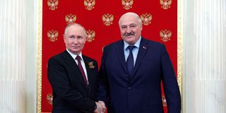 Russian President Vladimir Putin greets Belarus' President Alexander Lukashenko