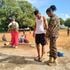 Youth being inspected by soldiers during KDF recruitment in Lamu