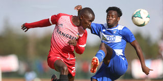 Sichenje Ronald (right) of AFC Leopards vies for the ball with Shabana's Aduda Abisolom