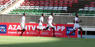 Shabana's Vincent Nyabuto (right) leads teammates in celebration