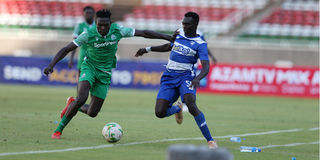 Gor Mahia defender Rooney Onyango (left) vies with AFC Leopards forward Victor Otieno