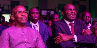 Safaricom CEO Peter Ndegwa (left) and Chief of Staff and Head of the Public Service, Felix Koskei 