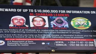A placard bearing pictures of al-Shabaab leaders Mahad Karate,Jehad Mostafa and Ahmed Diriye