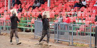 Workers put on the final touches at the Kericho Green Stadium 