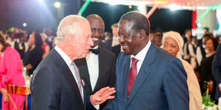 King Charles III chats with ODM leader Raila Odinga as President William Ruto