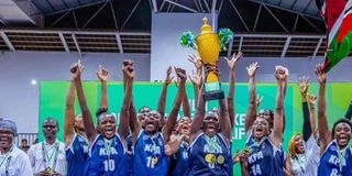 Kenya Ports Authority (KPA) players celebrate with the trophy 