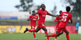 Kenya Police defender Aboud Omar (left) celebrates with teammate Francis Kahata