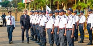 Private Security Regulatory Authority Director-General Fazul Mahamed inspects a guard of honour