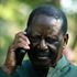 Azimio leader Raila Odinga in a phone call during Azimio Parliamentary Group Presser at Kalonzo Command Centre