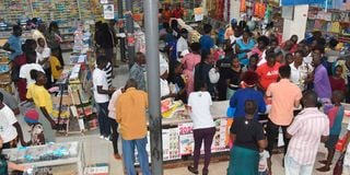 Customers do last-minute school shopping at Veghela Bookshop in Kakamega town