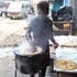 A man prepares chapati