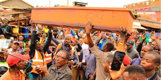 Protesters in Nyamache demand for the arrest of South Mugirango MP Silvanus Osoro