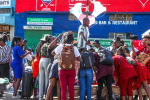 Shoppers look through second-hand clothes at Gikomba Market