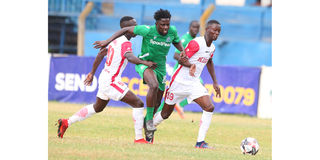 Gor Mahia midfielder Austin Odhiambo (centre) vies with Ulinzi Stars players Bernard Ongoma (left) and Alex Masinde