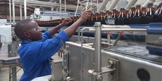 A worker at Keroche Breweries in Naivasha.