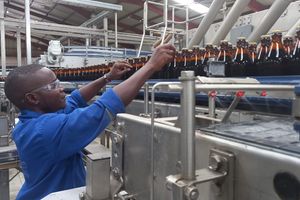 A worker at Keroche Breweries in Naivasha.