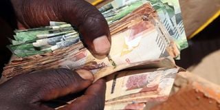 Counting Kenya Shilling Notes