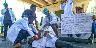 Doctors take part in a protest 