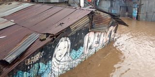 Flooded homes are seen at Mukuru-Kayaba slum