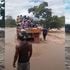 Some local residents tried to cross the swollen river with a truck, but the attempt ended in disaster with their car being washed away.