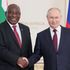 Russian President Vladimir Putin shakes hands with South African President Cyril Ramaphosa