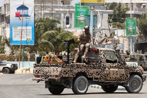 A Somali security officer holds position