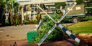 Uprooted Road signage, outside Parliament buildings, Nairobi.