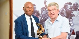 Kipchoge Keino and Thomas Bach